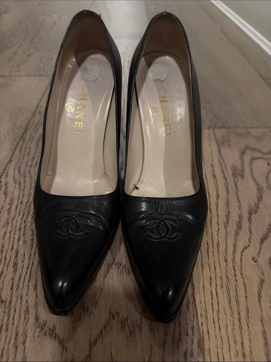CHANEL Shoes - CHANEL Black Leather Pointed-Toe Logo Pumps